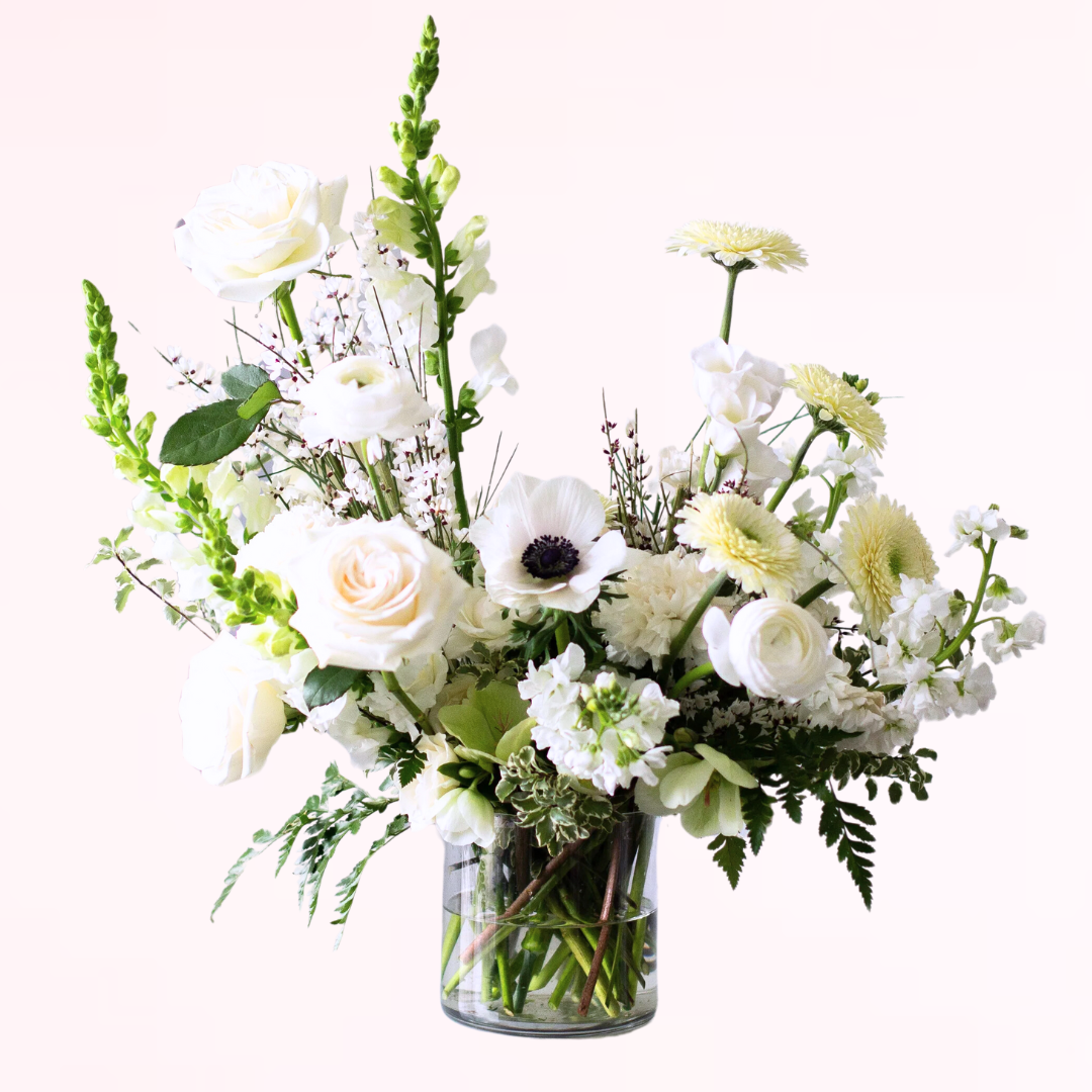 Send your condolences with a soothing sympathy arrangement from Wild Heart Floral in Austin, TX